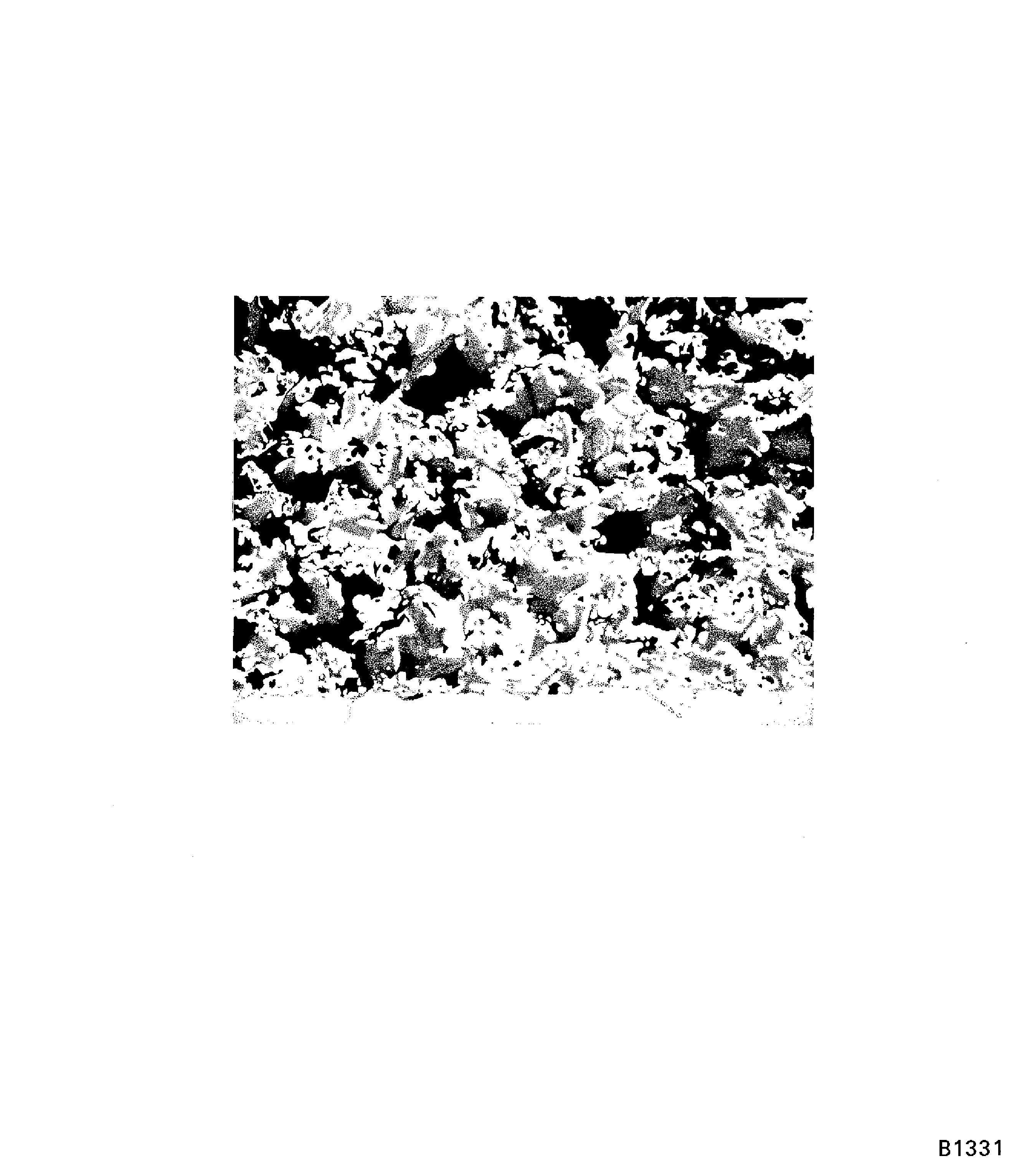 Satisfactory porosity in PWA 75-1 coating on blade roots (100X)